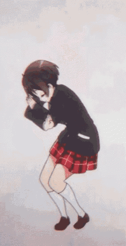 a girl in a school uniform is dancing