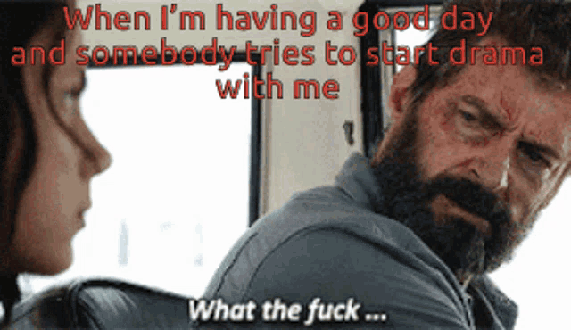 a man with a beard is talking to a woman and says " what the fuck "
