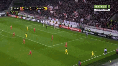 a soccer game between kln and bate is being shown on a television screen