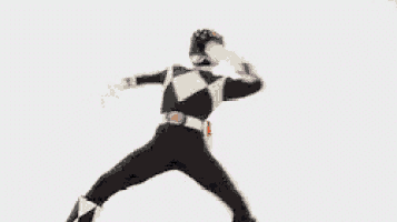 a black and white power ranger is dancing with his arms outstretched .