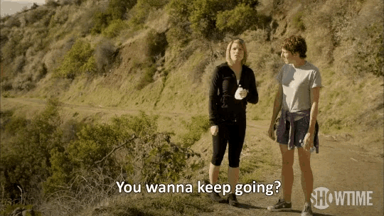 two women standing on a dirt road with the words " you wanna keep going " written on the bottom