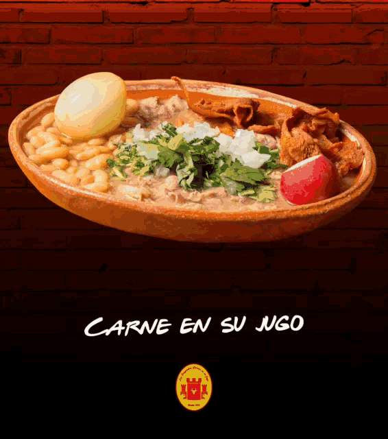 an advertisement for carne en su jugo shows a bowl of food on a table