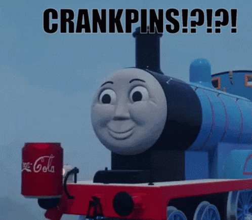 thomas the train is holding a can of coca-cola