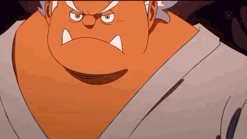 a close up of a cartoon character 's face with a very angry expression .