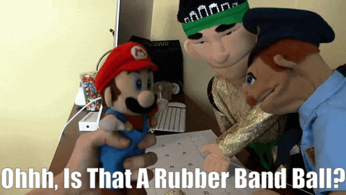 a rubber band ball is being held by a mario doll