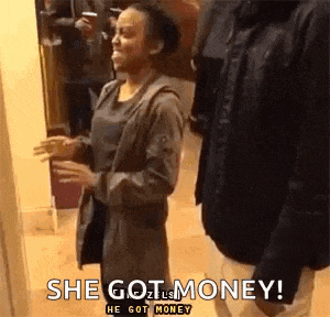 a man and a woman are standing next to each other in a room and the woman is saying `` she got money ! ''