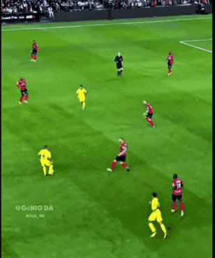 a soccer game is being played on a field with a sign that says eag inside boutik