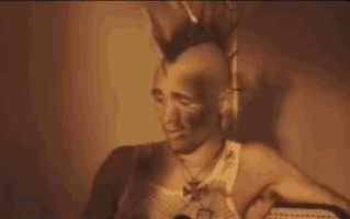 a man with a mohawk and the words det ar ju asiktsregistrering on the bottom