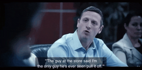 a man in a blue shirt says " the guy at the store said i 'm the only guy he's ever seen pull it off "