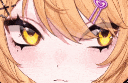 a close up of a girl 's face with yellow eyes and a purple heart hair clip