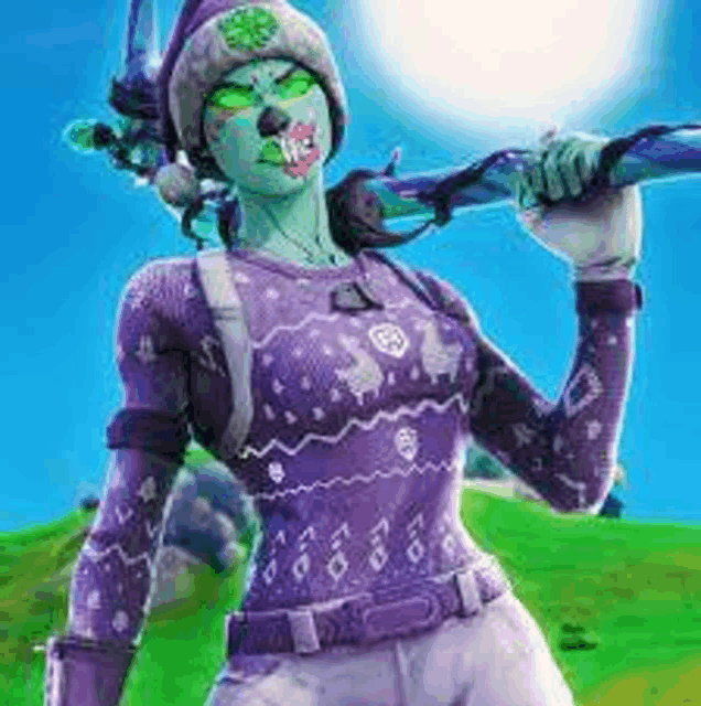 a woman in a purple sweater is holding a sword in her hand .