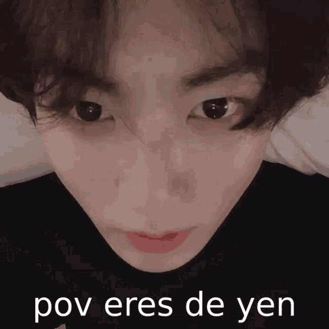 a close up of a person 's face with the words pov eres de yen written below it