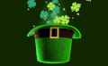 a green leprechaun hat with a belt and clovers coming out of it .