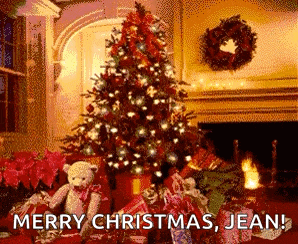 a christmas tree in a living room with gifts underneath it and the words merry christmas jean !