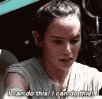 a woman is sitting at a table and saying `` i can do this ! ''