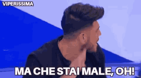 a man is making a funny face and says ma che stai male oh !