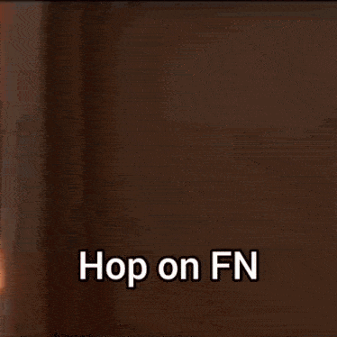 a person is standing in a room with the words hop on fn written on the bottom