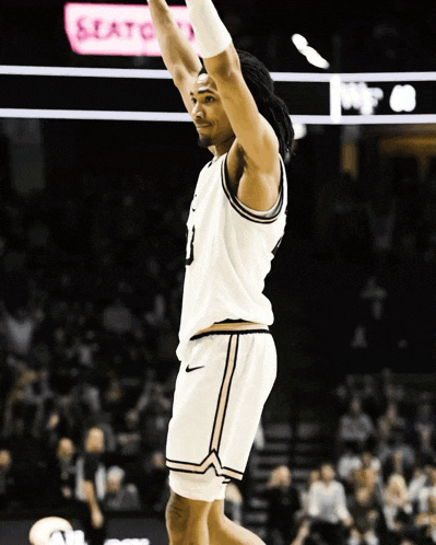 a basketball player with the number 1 on his jersey is jumping in the air