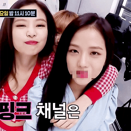 two girls are standing next to each other with a sign that says jj above them