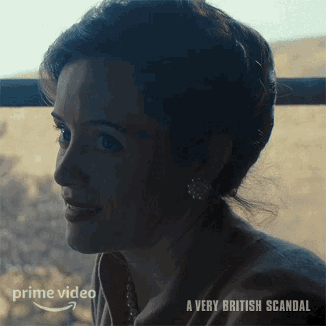 a close up of a woman 's face with the words a very british scandal on the bottom
