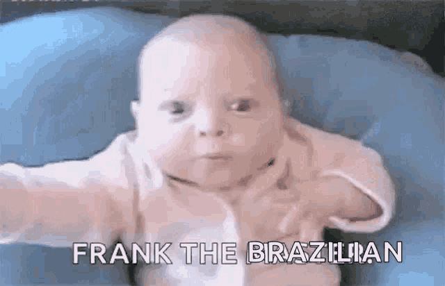 a baby is laying on a blue pillow with the words `` frank the brazilian '' written above it .