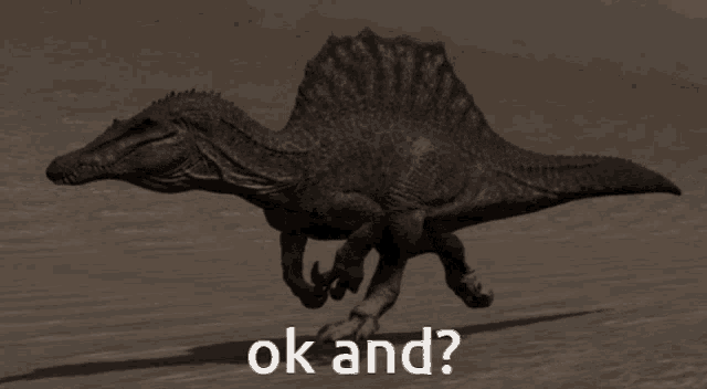 a picture of a dinosaur with the words ok and written below it