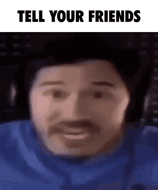 a blurry picture of a man 's face with the words tell your friends written above it .