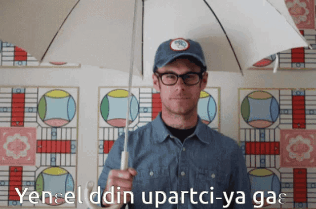 a man holding an umbrella with the words yenselddin upartci-ya gae