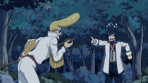 a man in a white jacket is pointing at another man in a white coat