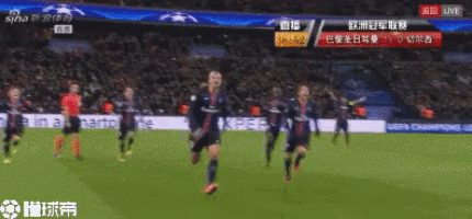 a soccer game is being played in a stadium with chinese writing on the screen