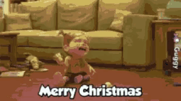 a baby is crying in front of a couch and the words merry christmas are on the screen