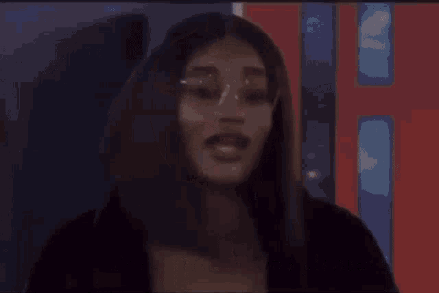 a woman with glasses says " i 'm a child of god please "