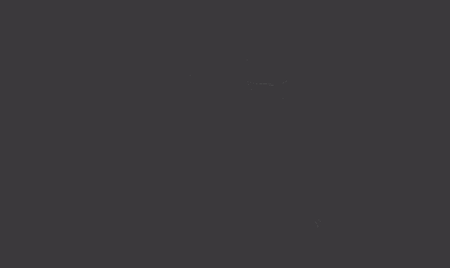 a blurred image of a person holding a sword on a black background