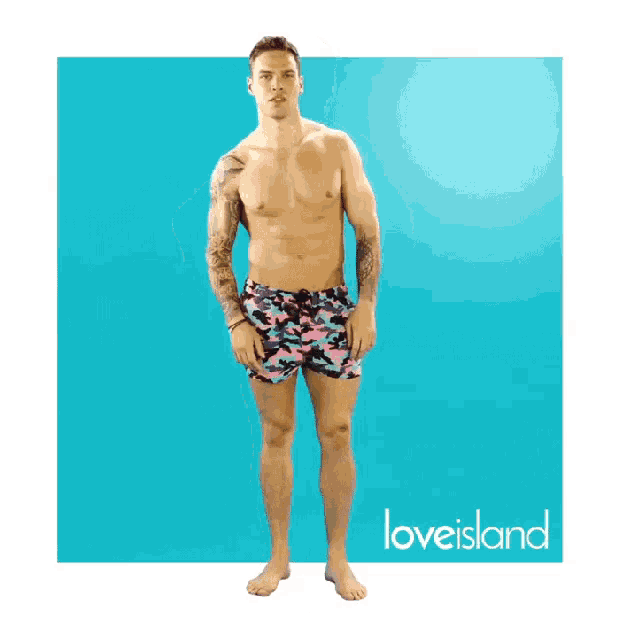 a shirtless man in swim trunks is dancing in front of a blue background with love island written on it