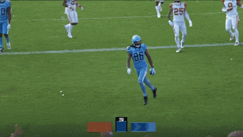 a toronto argonauts football player is being congratulated by a crowd