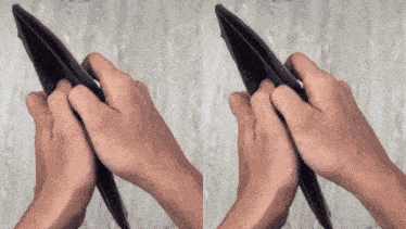a person holding a wallet in their hands