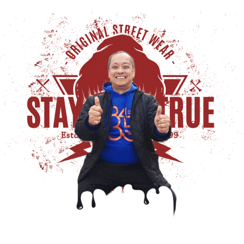 a man is giving a thumbs up in front of a logo that says stay true