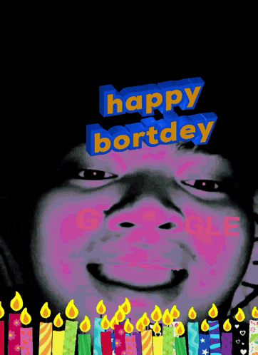 a picture of a child with candles and the words happy bortdey above it