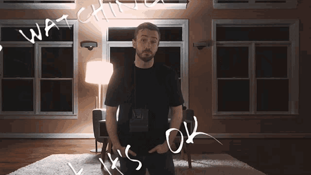 a man taking a picture of himself with the words but it 's ok below him