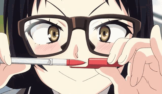 a girl with glasses holds a red pen to her nose