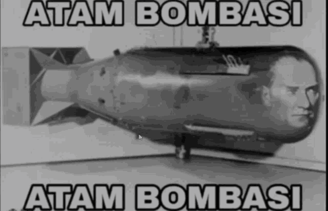 a picture of a bomb with a man 's face on it and the words " atam bombasi atam bombasi " below it