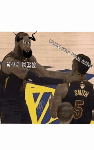 a basketball player with the number 5 on his back is talking to another player