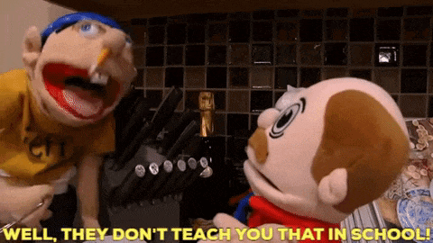 two stuffed animals are standing next to each other in a kitchen talking to each other .