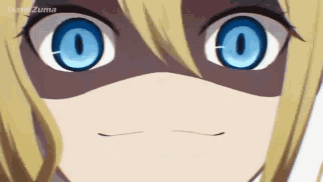 a close up of a cartoon character 's face with blue eyes