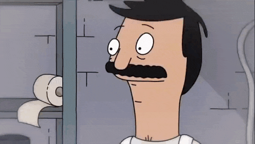 a cartoon character with a mustache is standing in front of a shelf with toilet paper .