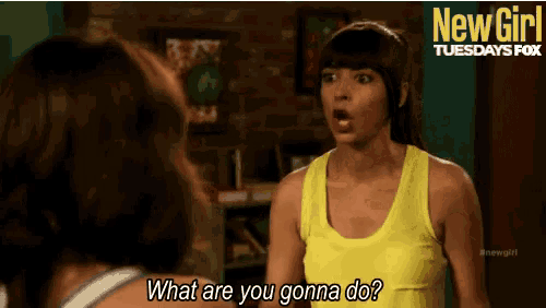 a woman in a yellow tank top is talking to another woman with the words what are you gonna do