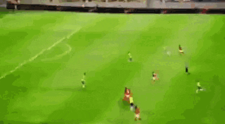 an aerial view of a soccer field with a white circle in the middle