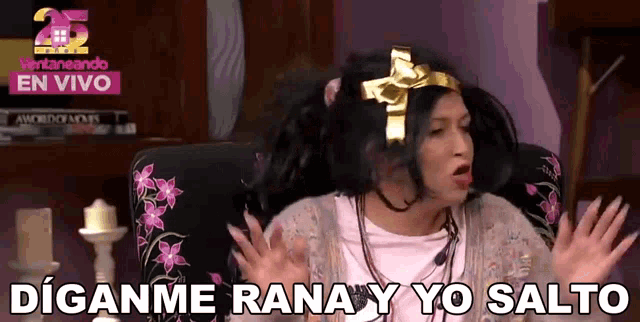 a woman is sitting in a chair with the words " diganme rana y yo salto " on the bottom