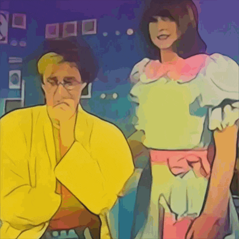 a man in a yellow jacket and a woman in a pink dress standing next to each other