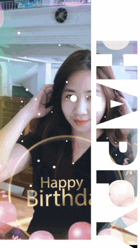 a woman wearing a black shirt that says happy birthday on it